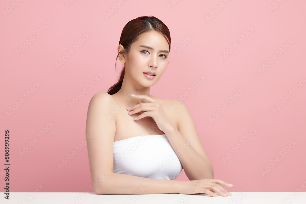 Beautiful young asian woman with clean fresh skin on pink background, Face care, Facial treatment, Cosmetology, beauty and spa, Asian women portrait. Beautiful young asian woman with clean fresh skin on pink background, Face care, Facial treatment, Cosmetology, beauty and spa, Asian women portrait.