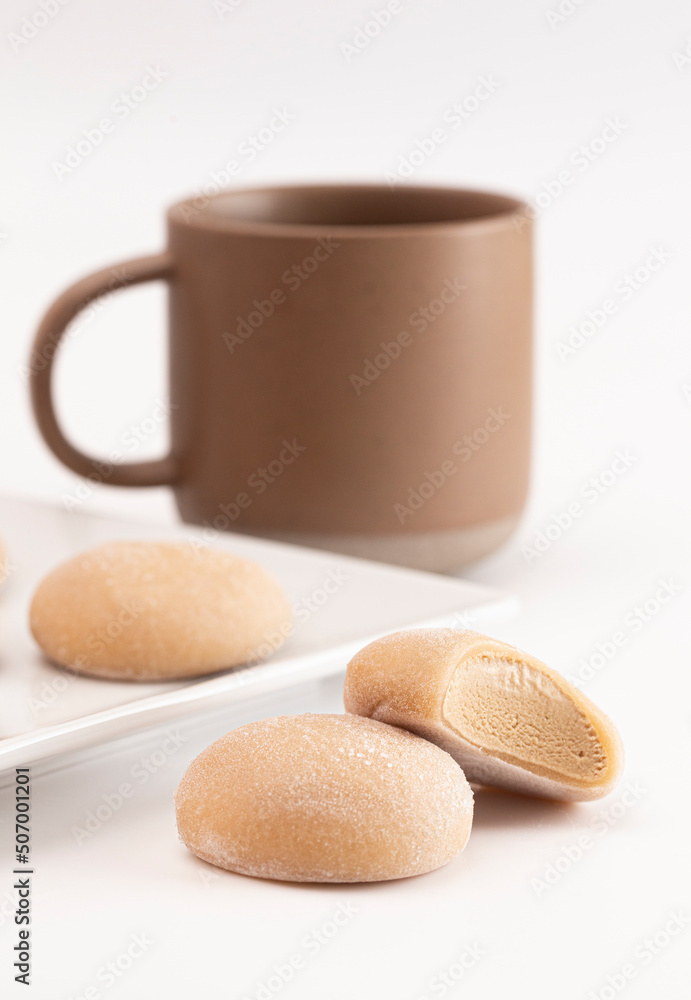 Coffee Flavored Mochi Ice Cream on a White Background Coffee Flavored Mochi Ice Cream on a White Background