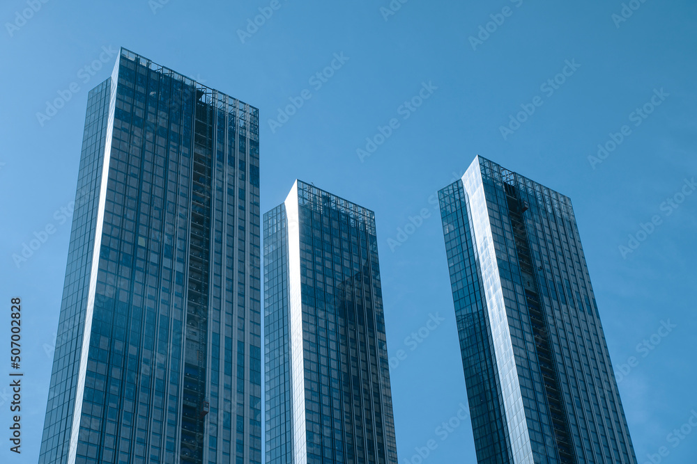 Fragment of a complex of high-rise office buildings. High quality photo Fragment of a complex of high-rise office buildings. High quality photo