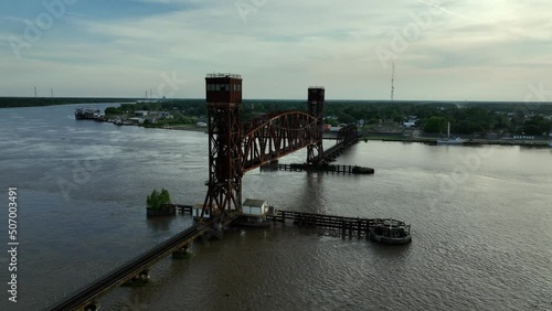 Aerial view of a railroad bridge lowering over the Atchafalaya River in Morgan City, Louisiana photo