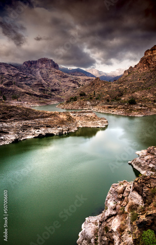 vertical landscape of the sunset in the Soria dam of the island of Gran Canaria Spain