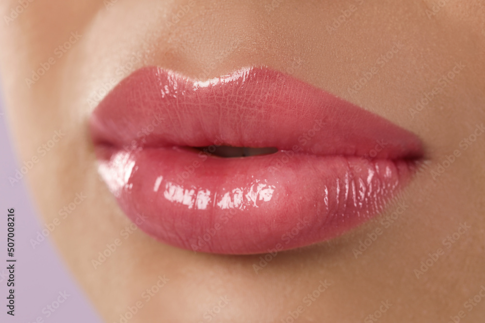 Woman with beautiful perfect lips after permanent makeup procedure, closeup Woman with beautiful perfect lips after permanent makeup procedure, closeup