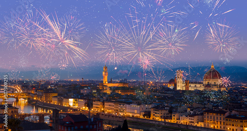 Fototapeta Naklejka Na Ścianę i Meble -  Florence, Ponte Vecchio, Florence Palazzo Vecchio and Florence Duomo with fireworks at dusk - Florence, Italy