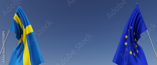 Photography Flags of Sweden and the European Union on flagpoles on sides