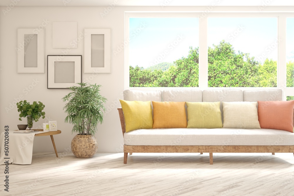 Fototapeta premium White living room with sofa and summer landscape in window. Scandinavian interior design. 3D illustration
