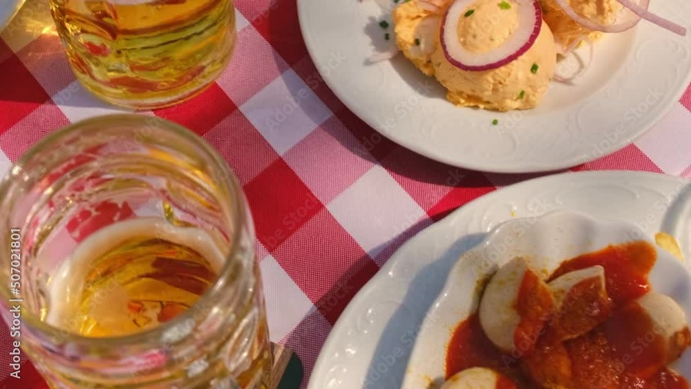 Bavarian beer in a brasserie and food. Selective focus. Bavarian beer in a brasserie and food. Selective focus.