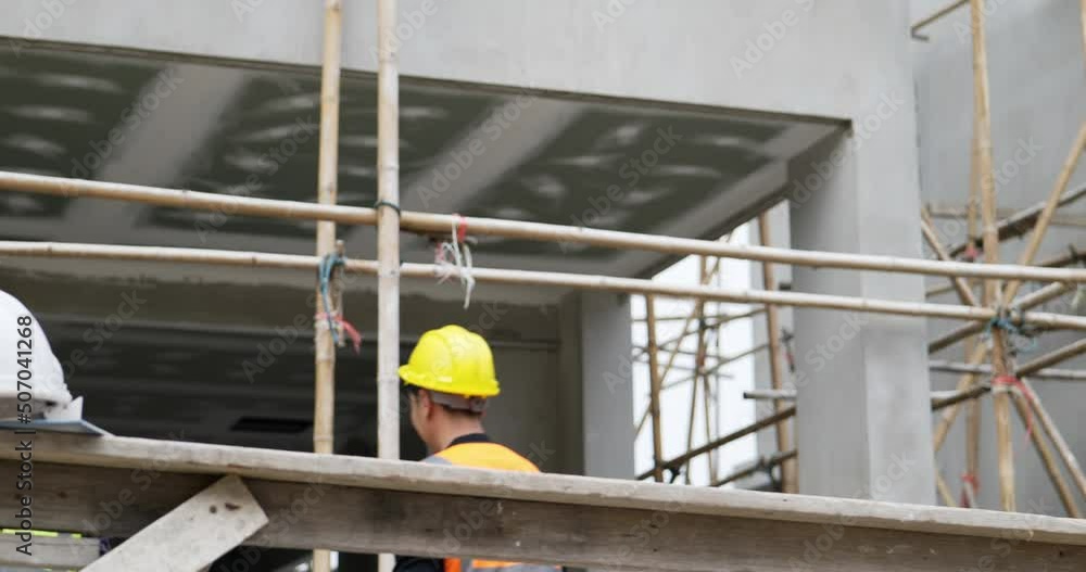 4K slow .Civil engineer walks into the house 4K slow .Civil engineer walks into the house