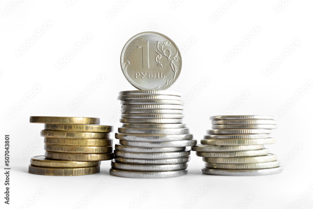Ruble Coins stacked in a tower on a white background Ruble Coins stacked in a tower on a white background