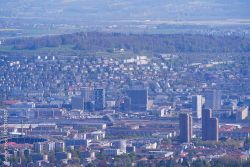 Aerial view over City of Z  rich seen from local mountain Uetliberg on a sunny spring day. Photo taken April 21st  2022  Zurich  Switzerland.