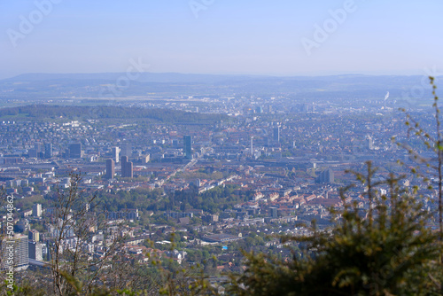 Aerial view over City of Zürich on a beautiful spring day with blue cloudy sky background. Photo taken April 21st, 2022, Zurich, Switzerland. © Michael Derrer Fuchs