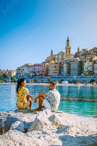 Canvas Print Menton France,couple men and woman on vacation at the Cote d Azur France, View o