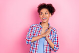 Photo of impressed brunette curly hairdo lady hold palms look promo wear plaid shirt isolated on pink color background