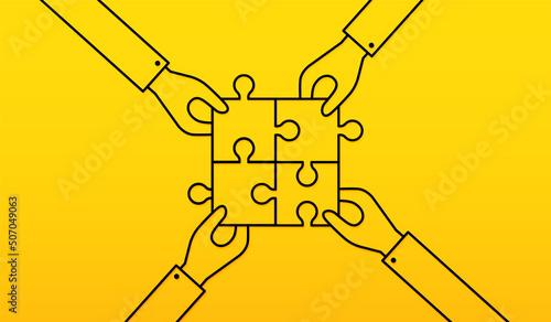 Hand holding  jigsaw puzzle on yellow background, Business solutions, cooperation and teamwork concept. Co-worker planning and strategy