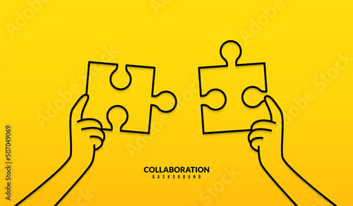 Two hand holding jigsaw puzzle to complete mission on yellow background, Business solutions, cooperation and teamwork concept. Co-worker planning and strategy