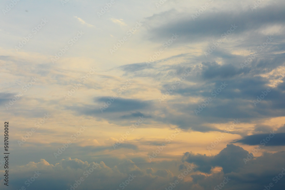 Beautiful clouds on sunset sky. High quality photo.