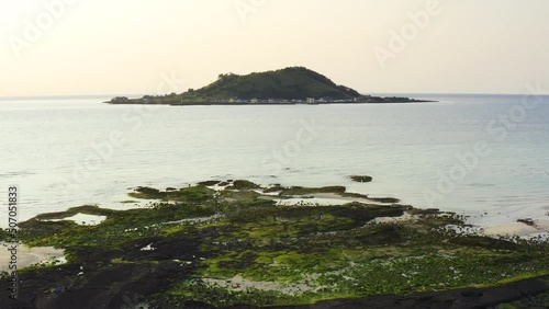 Drone shot of the seascape at sunset. Jeju Island Hyeopjae Beach photo