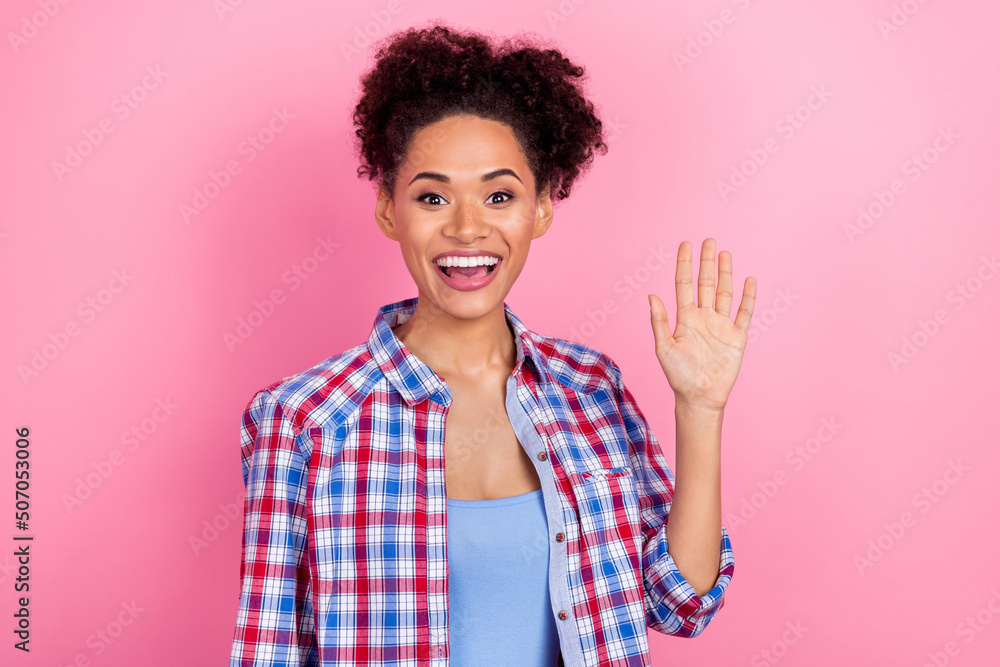 Photo of impressed wavy hairdo lady wave wear blue shirt isolated on pink color background Photo of impressed wavy hairdo lady wave wear blue shirt isolated on pink color background