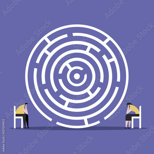 Conceptual illustration of a couple sitting in-front of a maze thinking about the solution