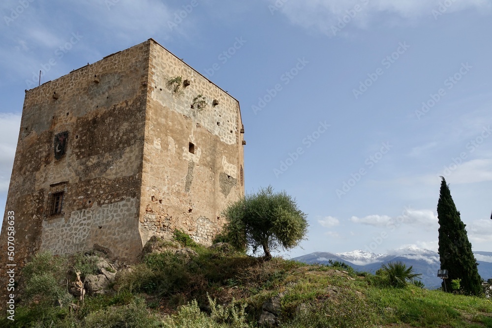View of the Ulloa tower in the Granada town of Vélez de Benaudalla (Spain) on a sunny spring morning