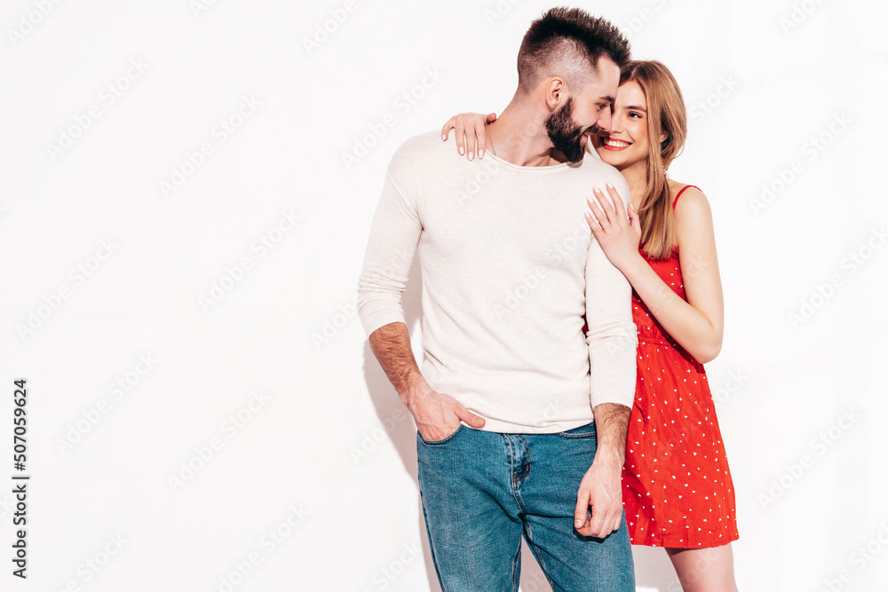Sexy smiling beautiful woman and her handsome boyfriend. Happy cheerful family having tender moments near blue wall in studio.Pure cheerful models hugging.Embracing each other. Cheerful and happy Sexy smiling beautiful woman and her handsome boyfriend. Happy cheerful family having tender moments near blue wall in studio.Pure cheerful models hugging.Embracing each other. Cheerful and happy
