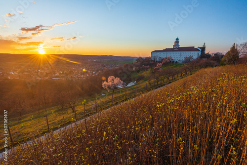 Pannonhalma Archabbey with the sun at the sunset time