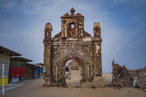 Old Roman Catholic church at Dhanushkodi south-eastern tip of Pamban Island, Tamil Nadu State, India. Dhanushkodi is an abandoned town. because it was destroyed during the Rameswaram cyclone in 1964. photo