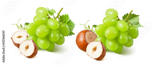Hazelnuts and green grapes set isolated on white background.