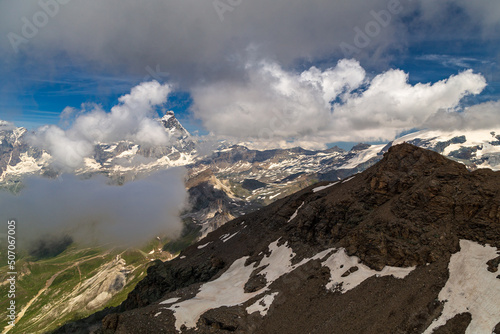 Summer trekking day in the mountains over Valtournanche photo