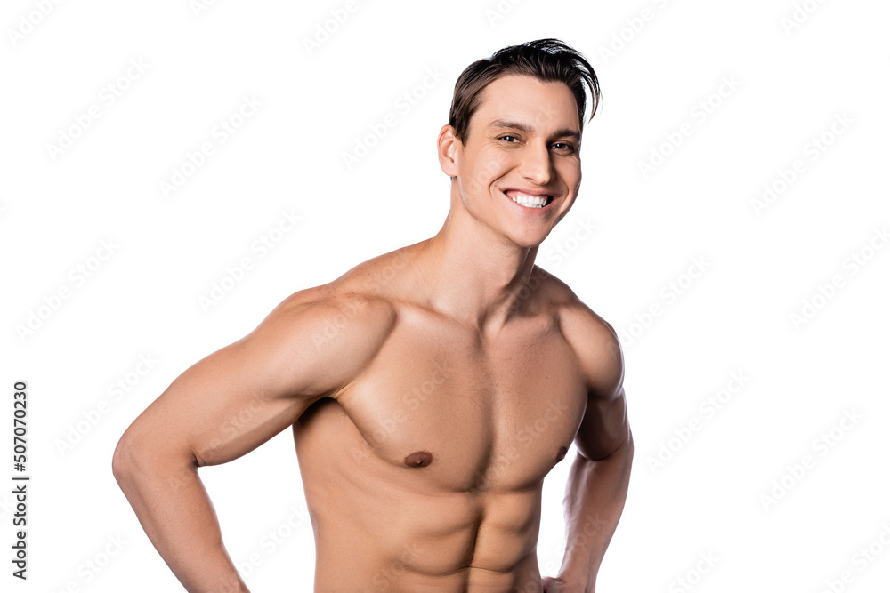 Fototapeta premium cheerful man with perfect body looking at camera isolated on white.