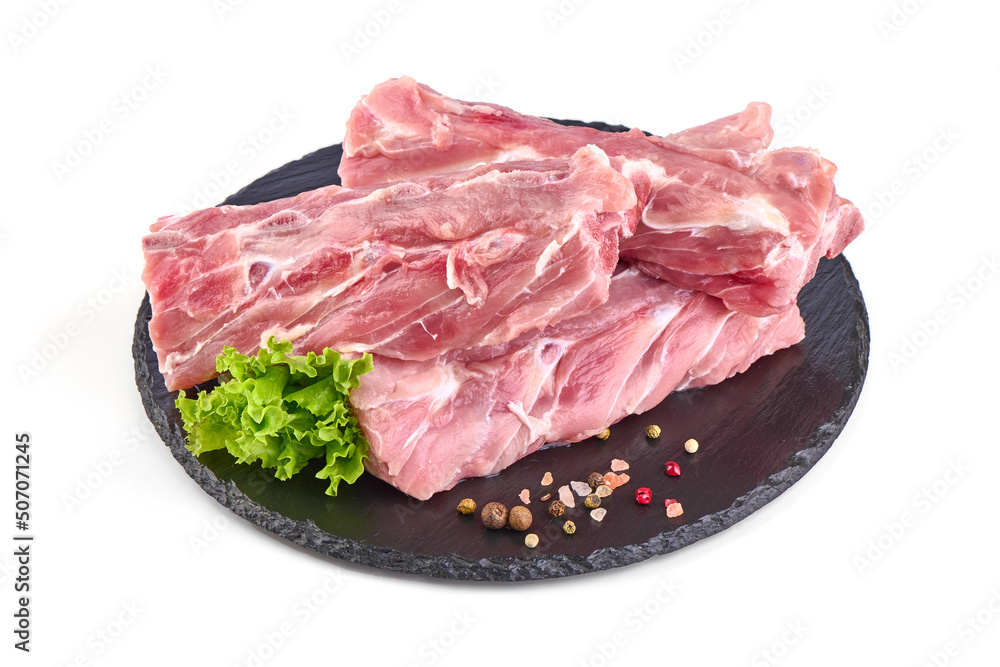Pork Ribs, raw meat, close-up, isolated on white background. Pork Ribs, raw meat, close-up, isolated on white background.