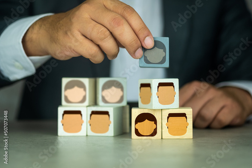 Man chooses an employee for building the team, assemble a business team, team building. photo