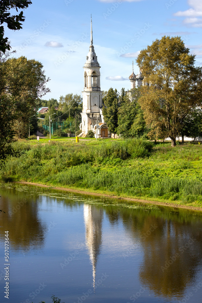 Ancient medieval Russian church on the bank of the river