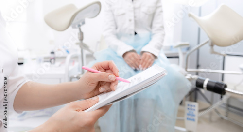 Фотография Gynecologist woman talk consultation with young female patient during medical in