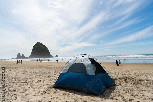 camping tent on beach of oregon haystack rock