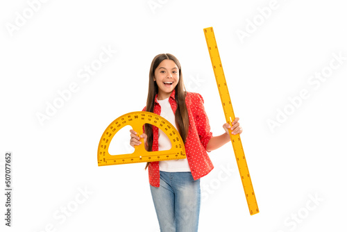 Konstfotografi happy kid hold protractor ruler study geometry at school isolated on white, scho