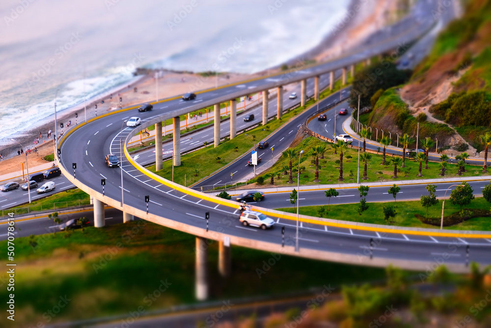 Car overpass by the ocean with a miniature effect. Lima, Peru.