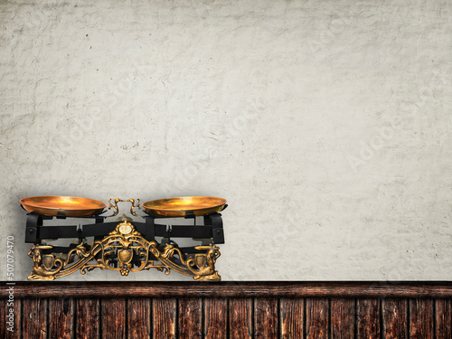 wooden trading counter with vintage scales on a light vintage ba photo