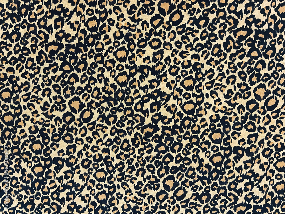 The brown tiger skin pattern printed on fabric The brown tiger skin pattern printed on fabric
