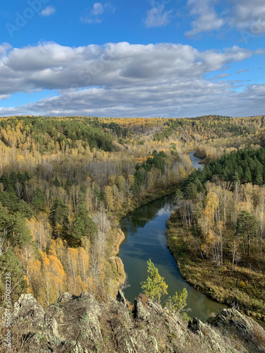 view of the taiga river and forest from the cliff
