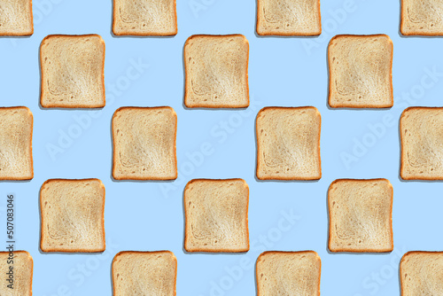 Tableau sur toile Seamless pattern with crispbread on blue background.