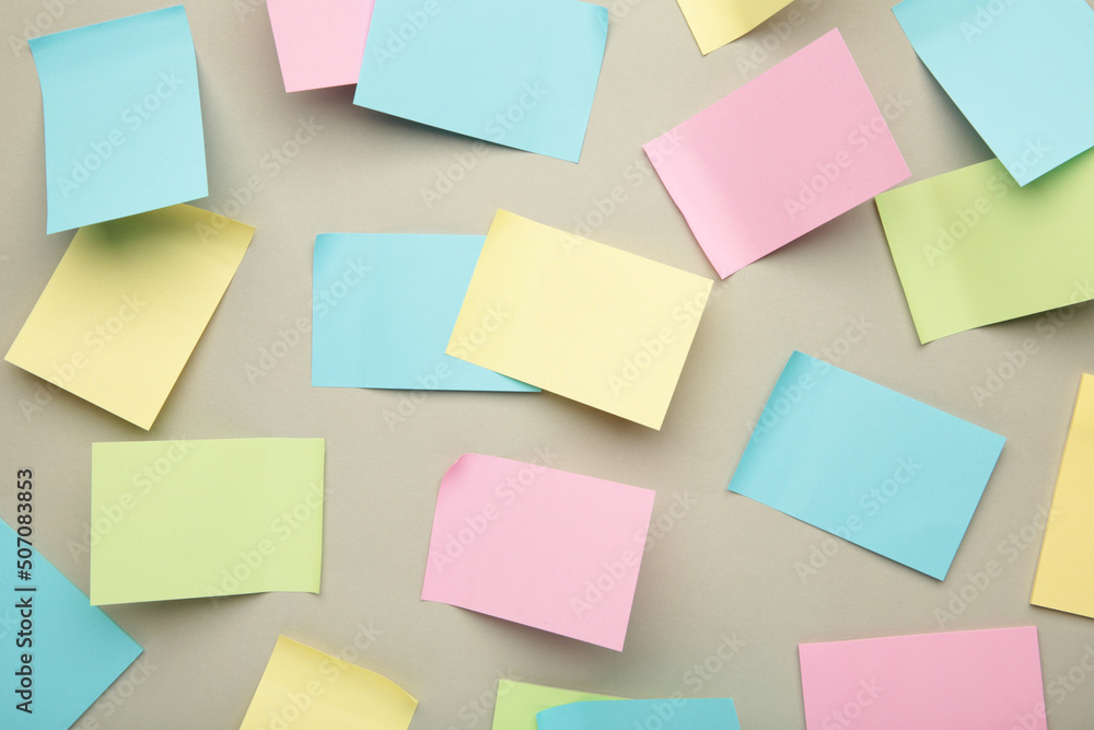 Colorful sticky notes on grey background. Colorful sticky notes on grey background.