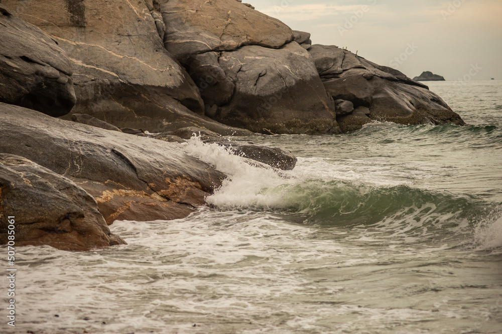 The waves of the sea swept towards the stone. The waves of the sea swept towards the stone.