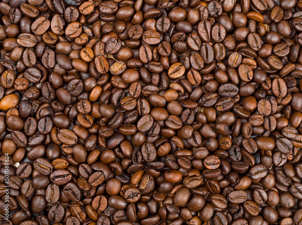 Fototapeta premium Roasted Coffee beans texture background, top view
