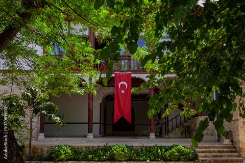 Wallpaper Mural Turkish flag in the garden of the traditional house. Torontodigital.ca