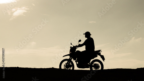 Tourists with motorcycles, motocross. Adventure tourists on motorcycles. men's holiday event ideas