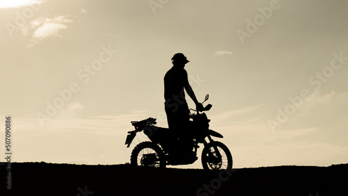 Tourists with motorcycles  motocross. Adventure tourists on motorcycles. men s holiday event ideas