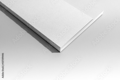 Branding notebook, brochure with cover sleeve mockup template, with sharp natural shadows, real photo. Blank isolated on a white background to place your design. 