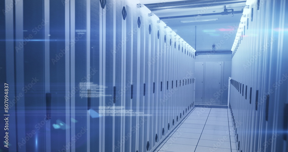 Computer servers in a server room with glowing lights Computer servers in a server room with glowing lights