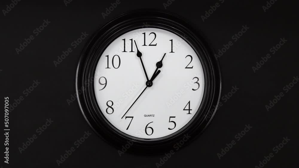 Classic Black And White Wall Clock With Black Background. Black Hands On The Clock. Timelapse. Wall Clock Face Beginning Of Time Of 1.00 Am Or Pm. 4k. ProRes. Classic Black And White Wall Clock With Black Background. Black Hands On The Clock. Timelapse. Wall Clock Face Beginning Of Time Of 1.00 Am Or Pm. 4k. ProRes.