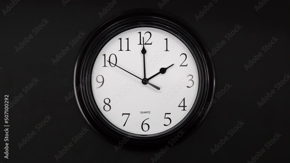 Classic Black And White Wall Clock With Black Background. Black Hands On The Clock. Wall Clock Face Of Time Of 2.00 Am Or Pm. 4k. ProRes. Classic Black And White Wall Clock With Black Background. Black Hands On The Clock. Wall Clock Face Of Time Of 2.00 Am Or Pm. 4k. ProRes.